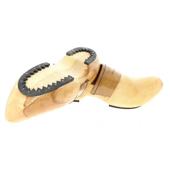 Varnished wooden clogs with soles