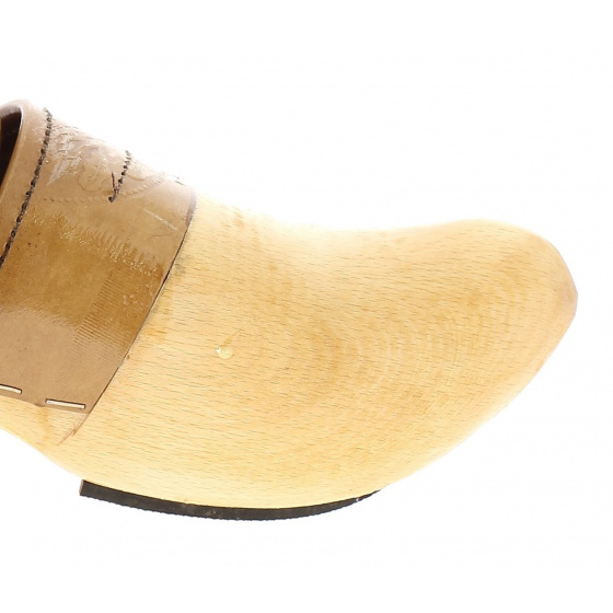 Varnished wooden clogs with soles